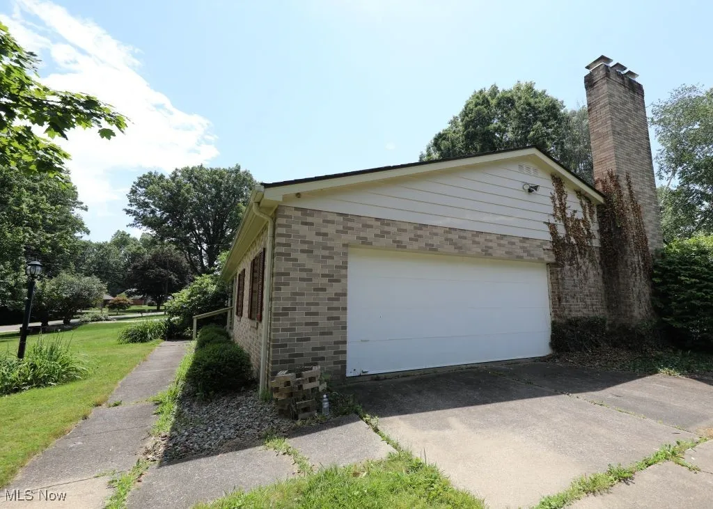 2 car garage with cement driveway.