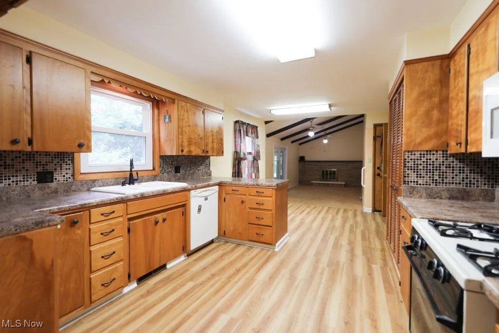 Spacious kitchen with dishwasher , stove, microwave.   All Vinal Flooring
