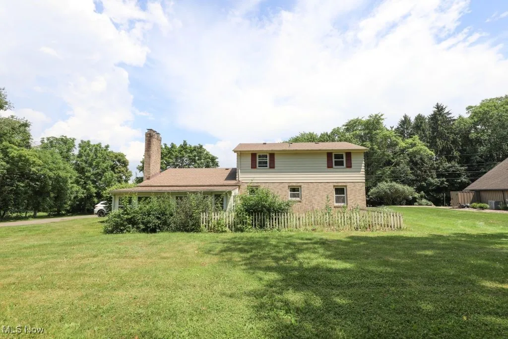 Back of the home showing the large sunporch.