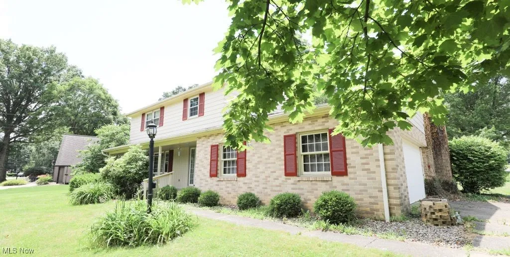 2 Story Brick and Vinyl siding.
