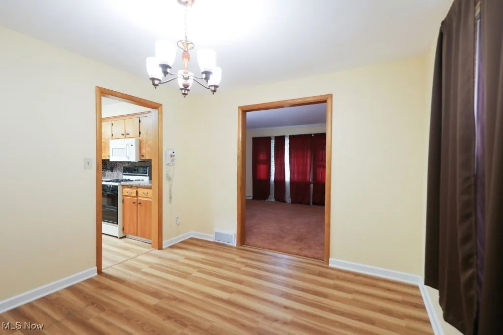 Formal Dining Area showing entrance from living room and kitchen
