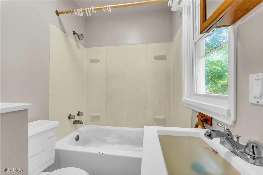 Full bath with  shower combination and vanity