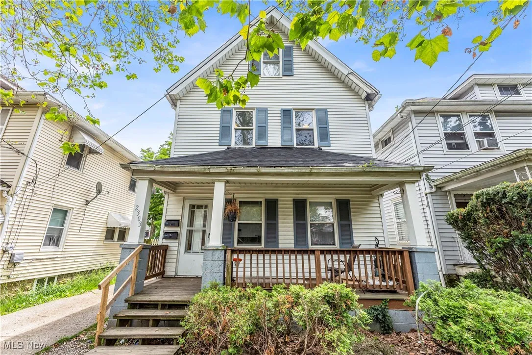 View of front of house with covered porch