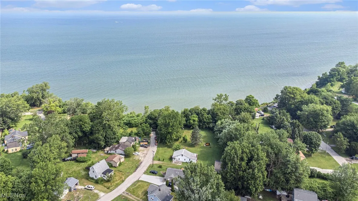 View of property location with a nearby body of water