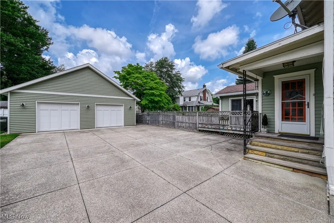 This oversized 2 car garage with door openers was newly built in 2022. The expansive driveway allows ample room to turn around  plus loads of parking.