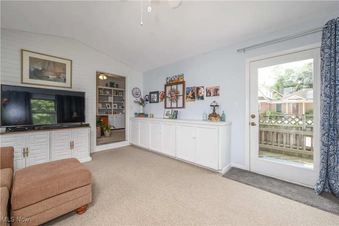 Additional view of the family/sunroom, showing sliding door with access to the deck and​​‌​​​​‌​​‌‌​‌‌​​​‌‌​‌​‌​‌​​​‌​​ backyard.