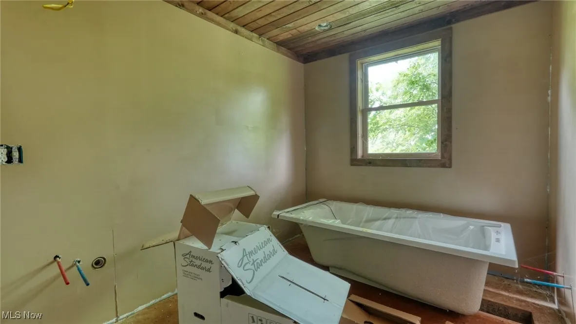 Misc room with wood ceiling