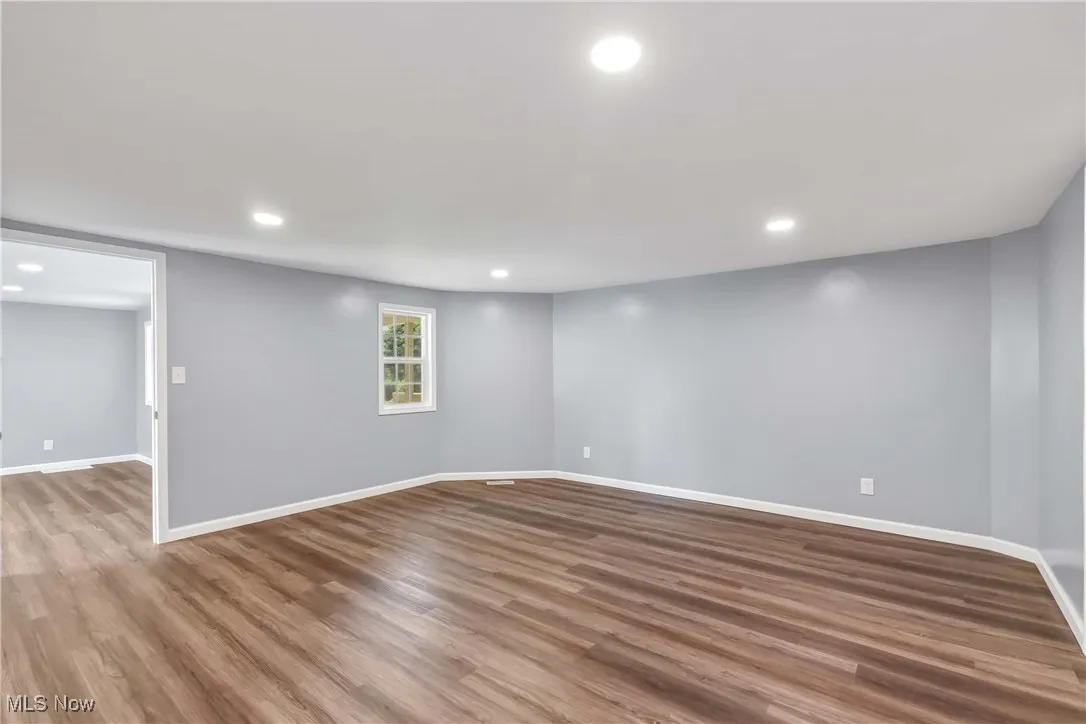 Unfurnished room featuring recessed lighting and wood finished floors