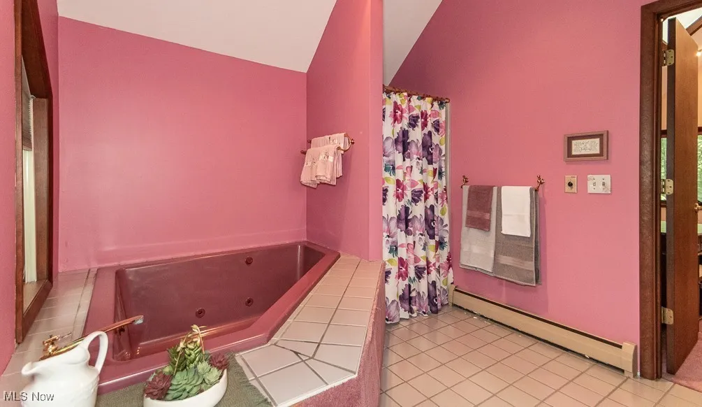 En suite with shower and whirlpool Tub