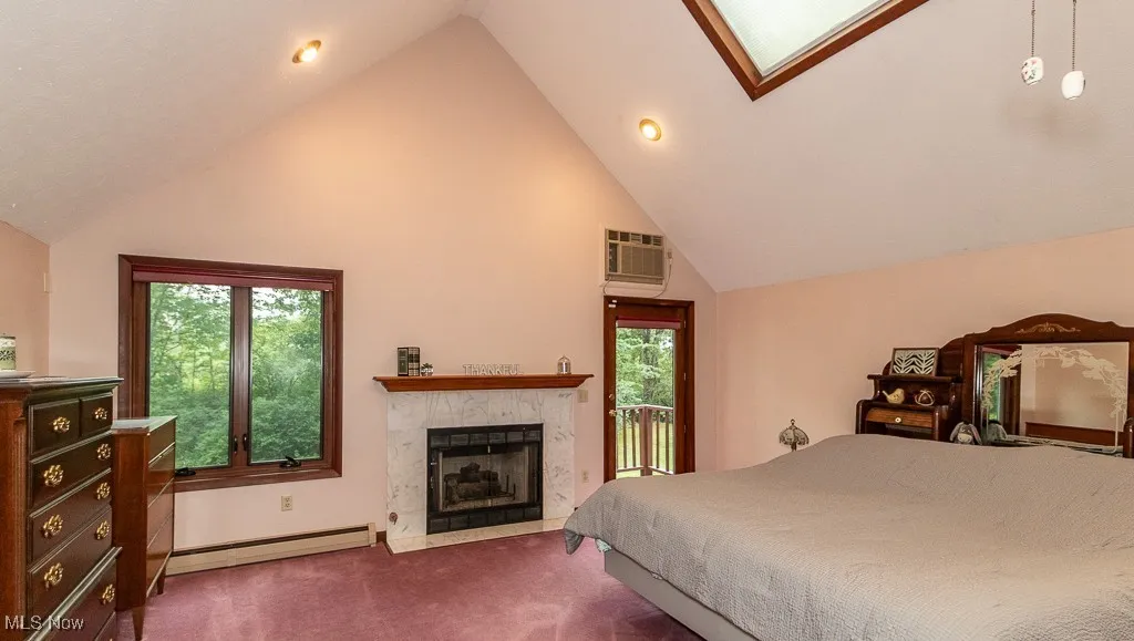 2nd floor bdrm showing fireplace