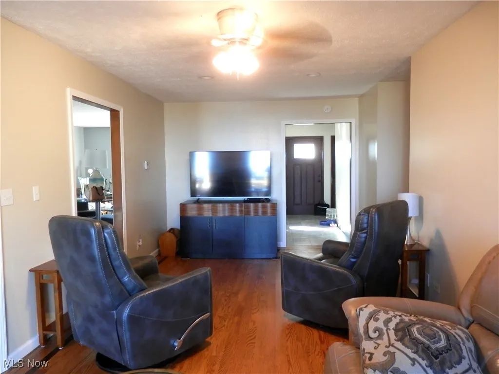 Family room with hardwood floors.
