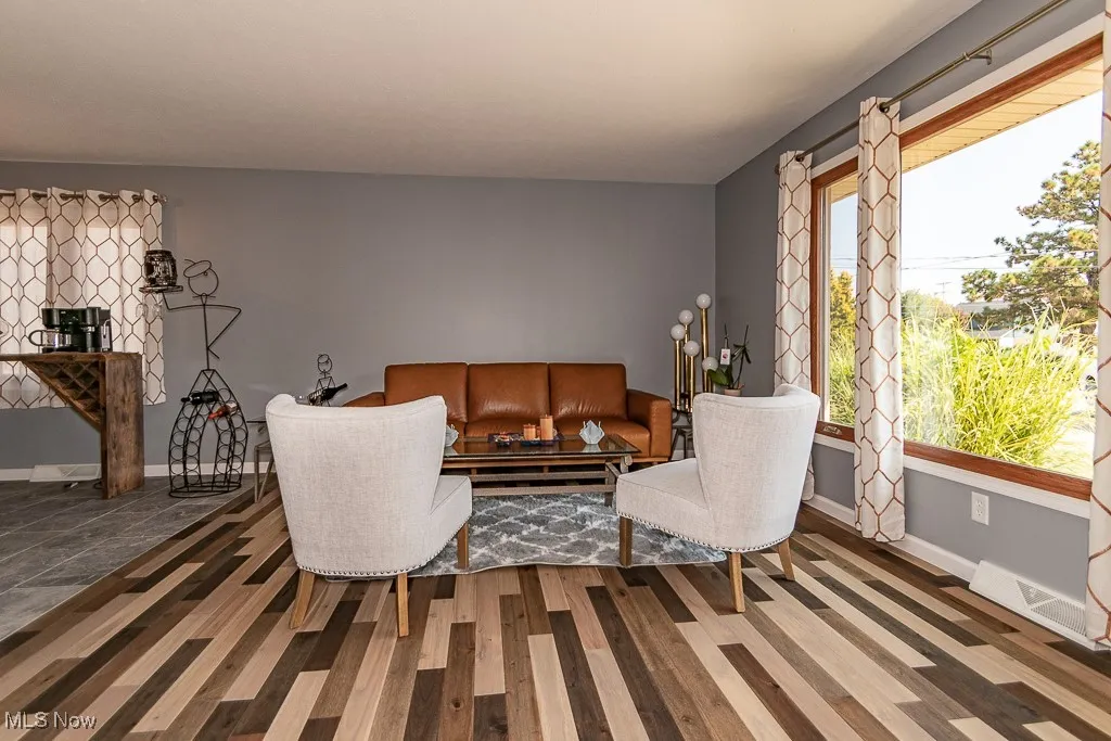 Living room with large front windows