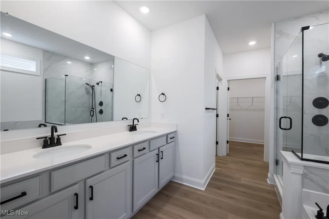 Owner's suite features a spa-like bath.
