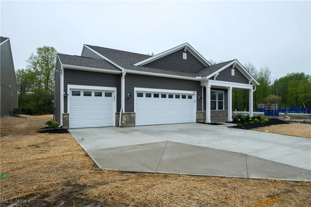 3-car garage with additional tandem space for storage.