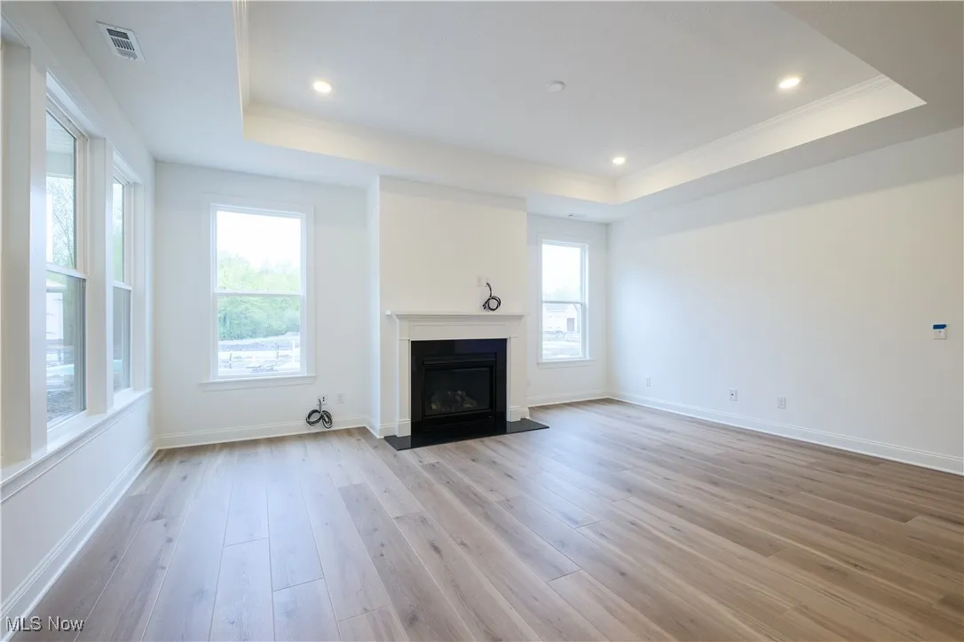 A gas fireplace is the focal point of the living space.