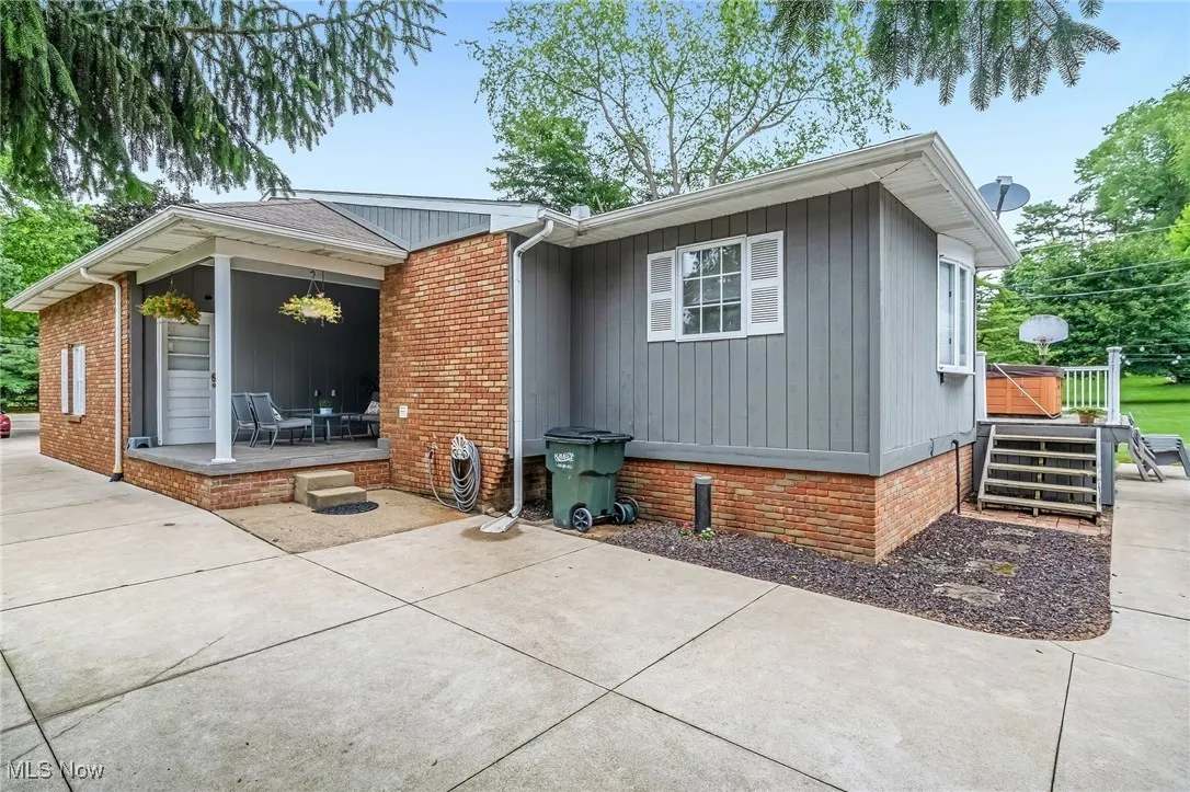 View of front of home featuring brick siding