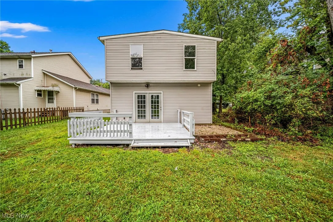 Back of house featuring a deck
