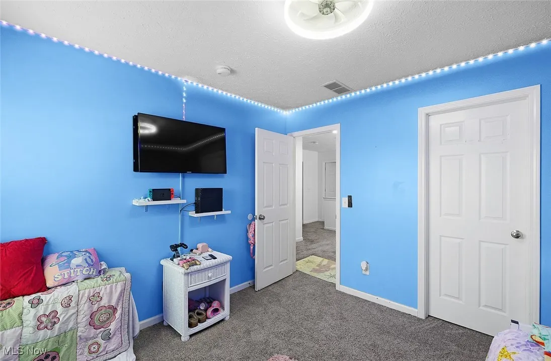 Carpeted bedroom