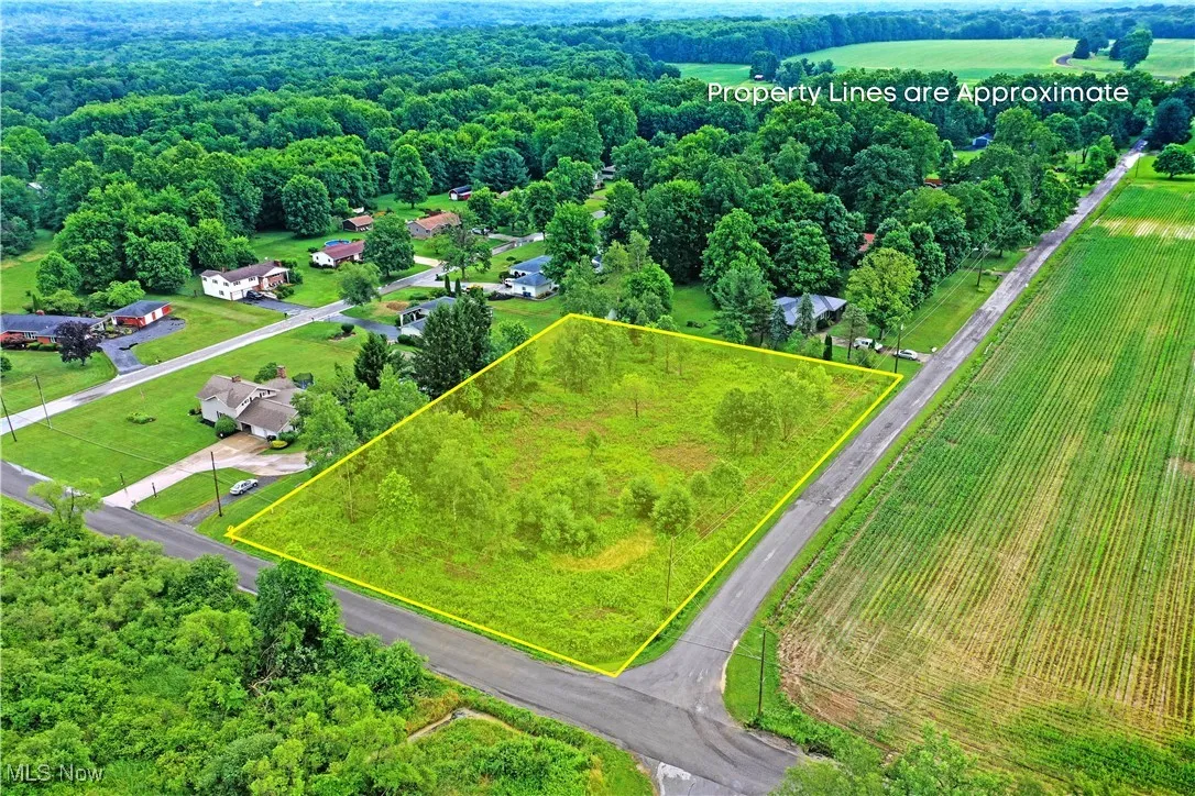 Aerial overview of property's location featuring property boundaries highlighted