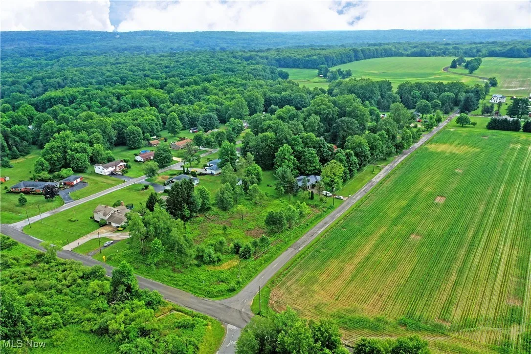 Aerial view of property's location with rural landscape