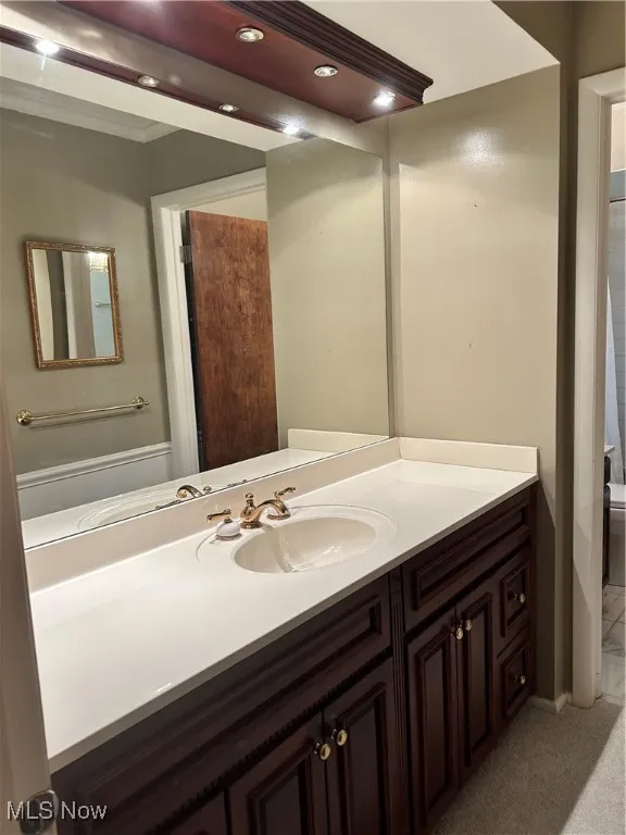 Bathroom with vanity and toilet
