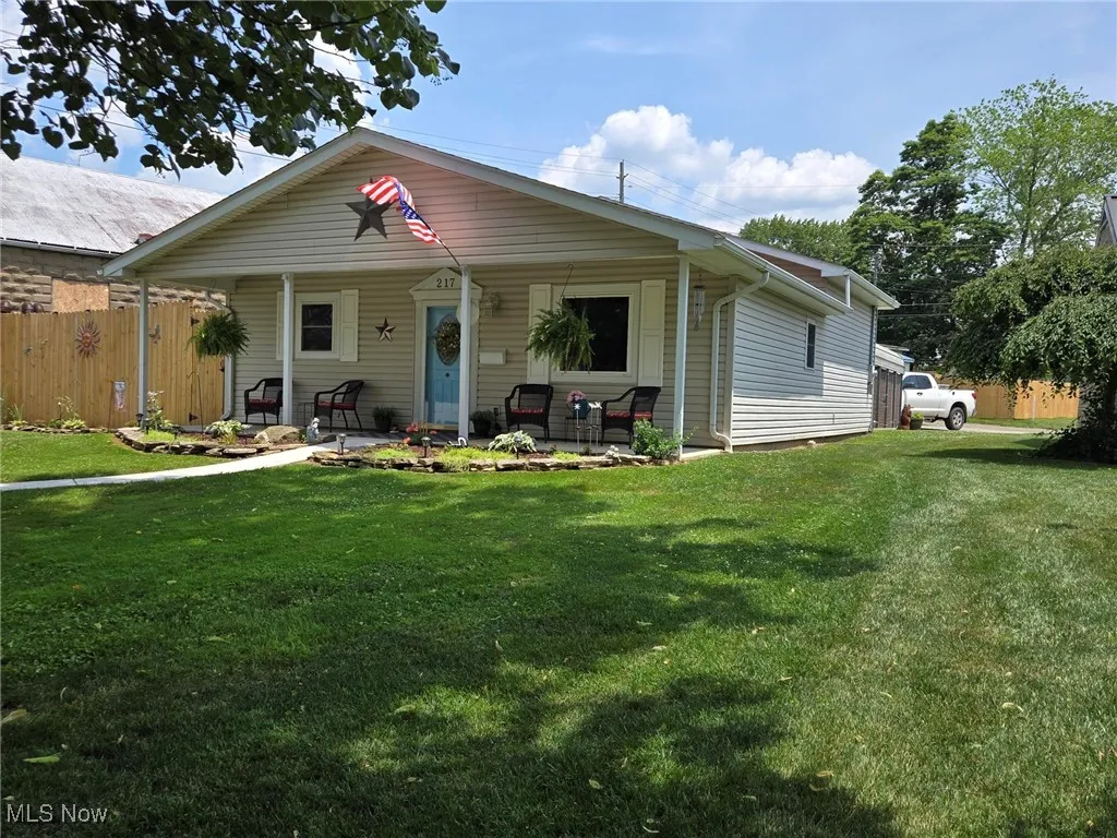 Bungalow-style house with a porch
