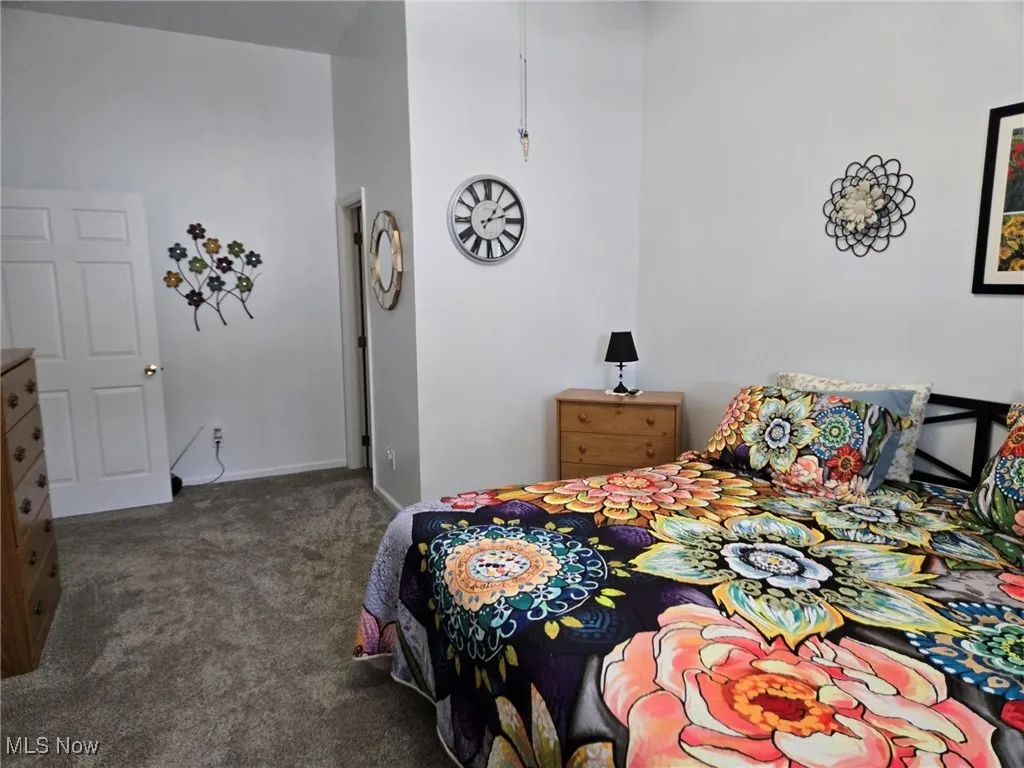 Bedroom featuring carpet