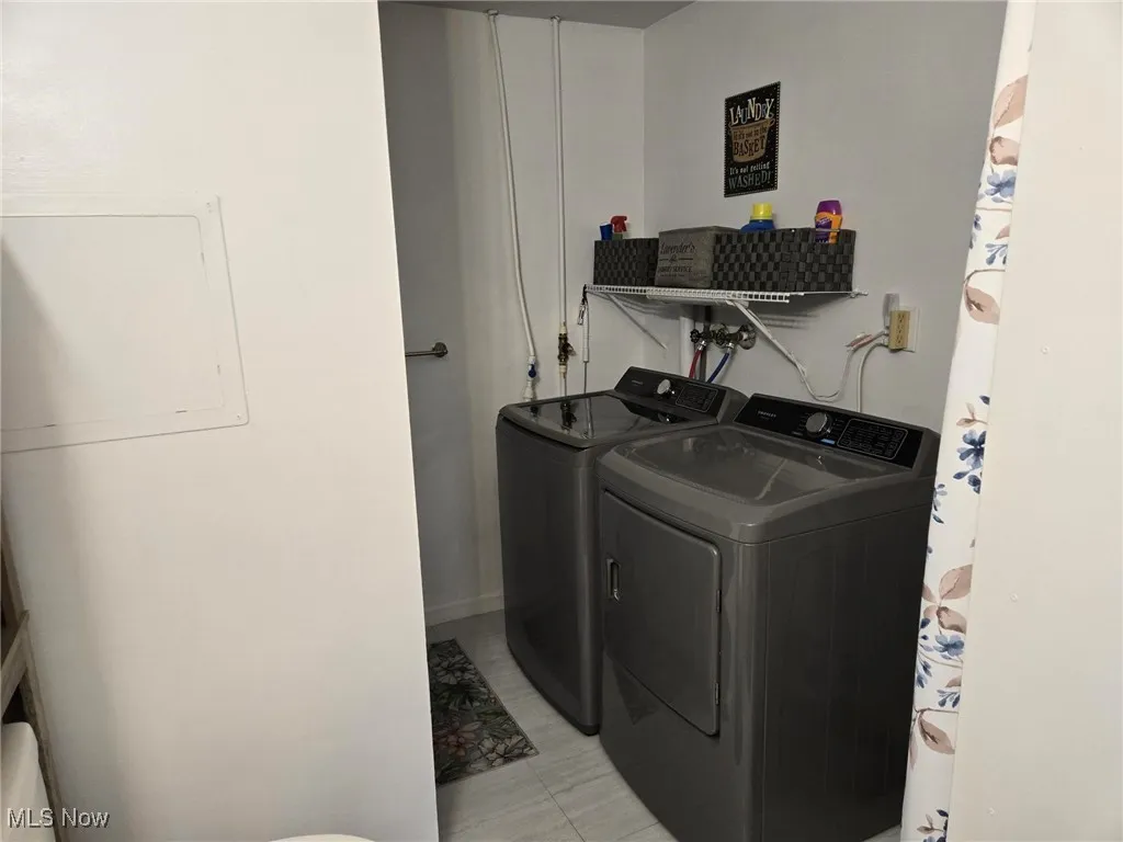 Laundry room featuring washer and dryer