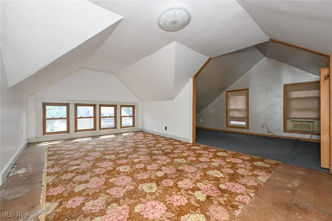 Bonus room with vaulted ceiling and cooling unit