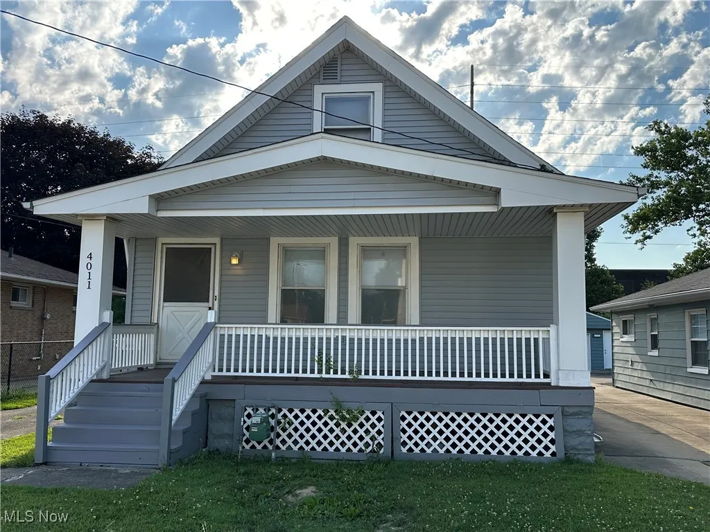 Shotgun-style home with covered porch