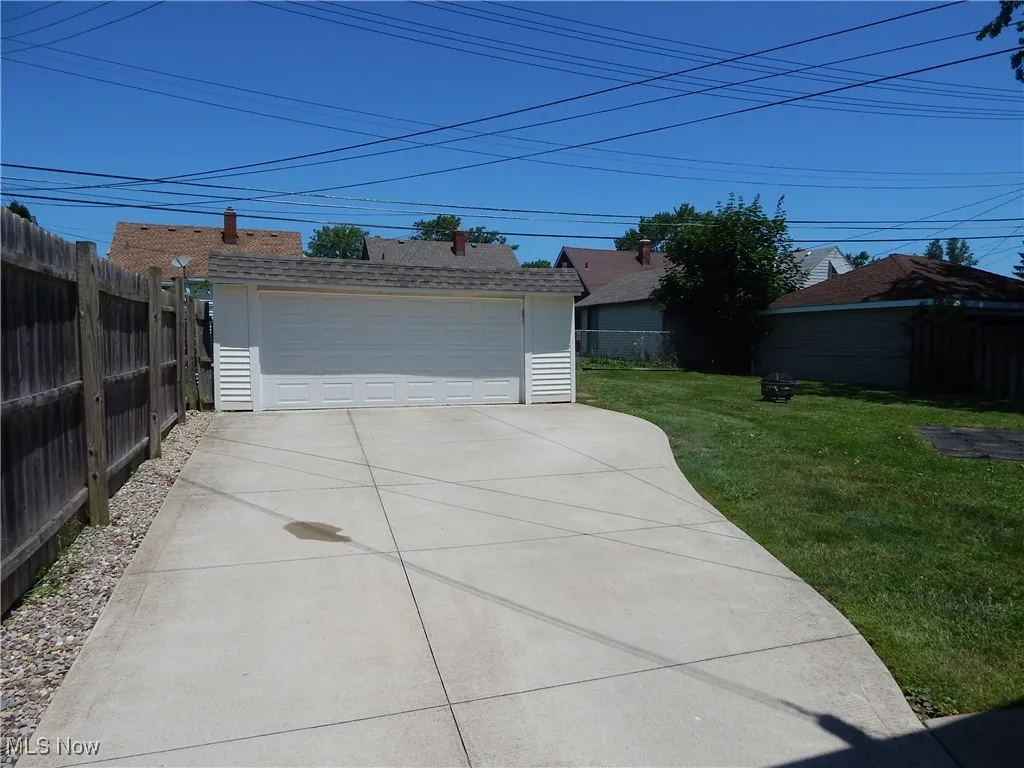 Newly Vinyl Sided 25, refurbished 2.5 car Garage with updated Garage Door and New Opener