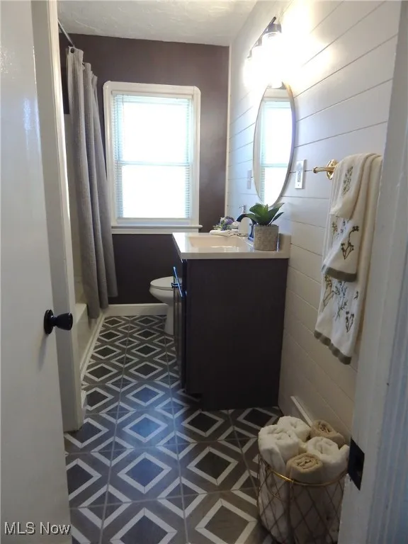 Full bathroom remodel with new Vanity, Fixtures, Toilet, new LVT flooring and Ship-Lap Wall