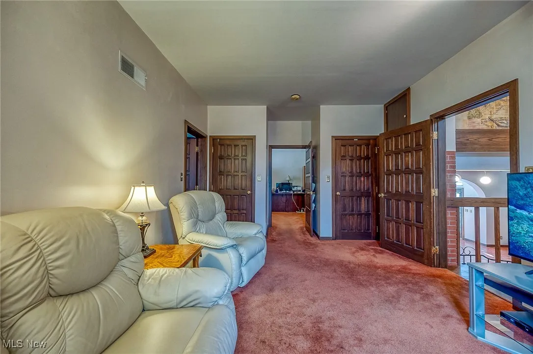 Living area with carpet flooring