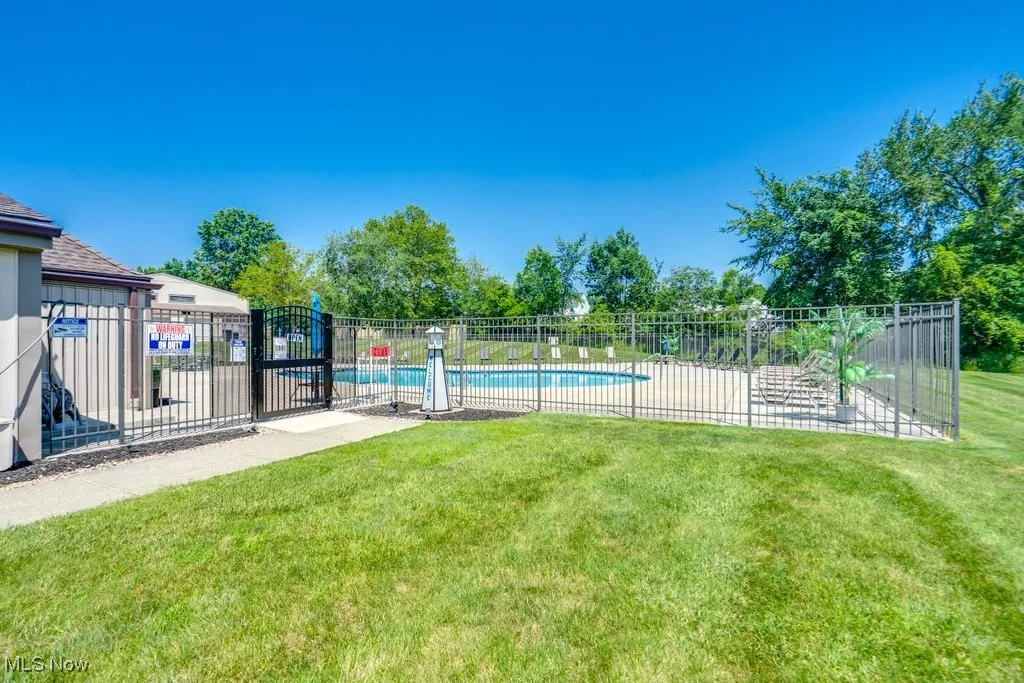View of yard with a community pool
