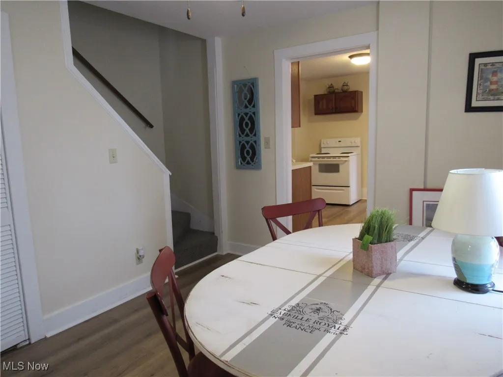 Another view of the dining room into the kitchen & utility closet is on the left side in the dining room!