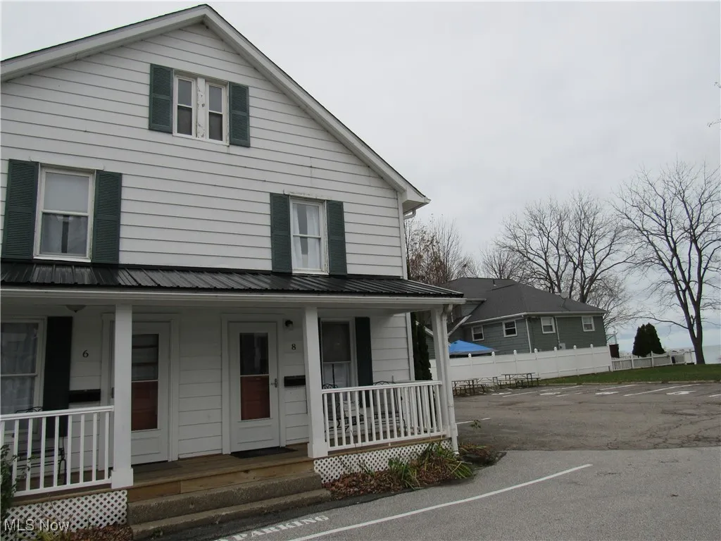 Unit #8 with two designated parking spaces for vehicles!  This unit is the closest to the common area & has wonderful Lake Erie views from the porch as well as the unit!