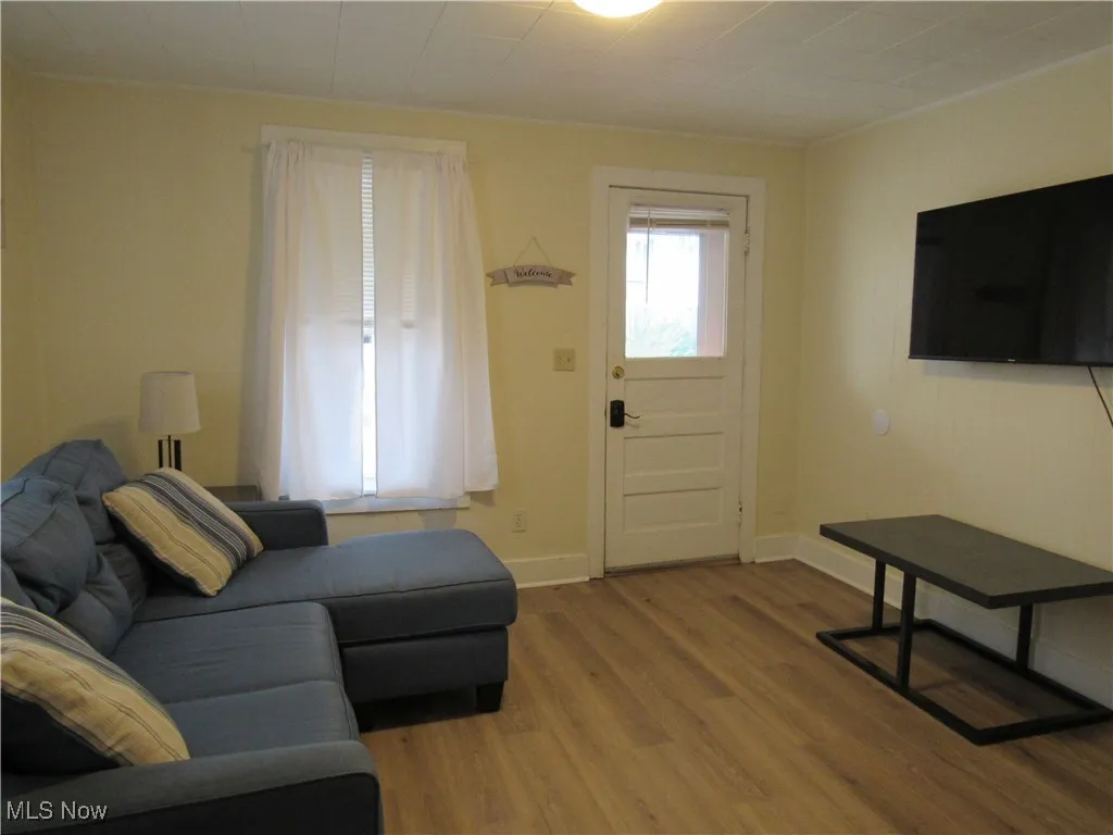 Neutral living room with window treatments!
