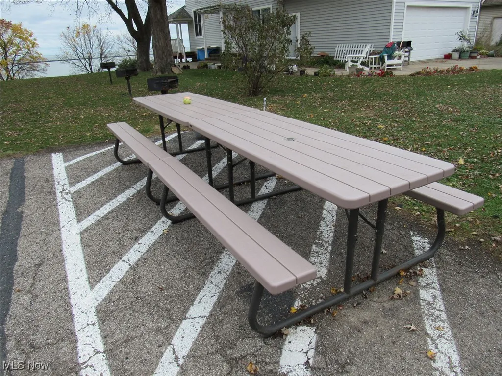 Picnic tables close to the grills in the common area!