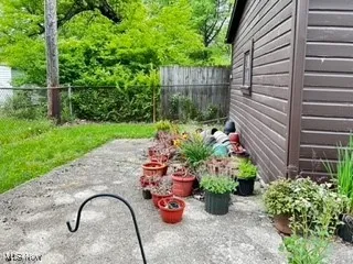 Side of garage paved