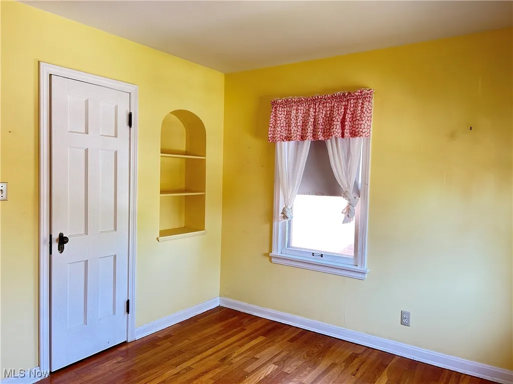 Second bedroom with built-in shelves