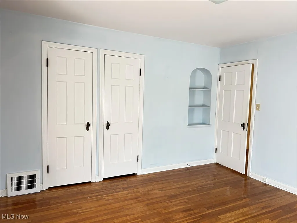 Bedroom with double closets