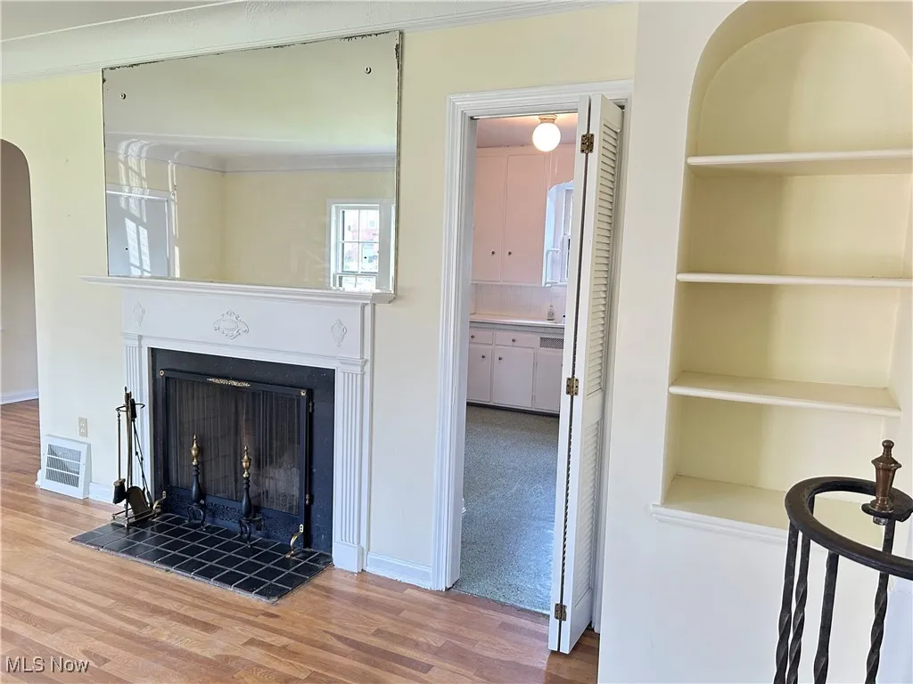Living room with built-in display shelves
