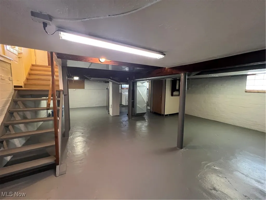 Below grade area featuring stairs