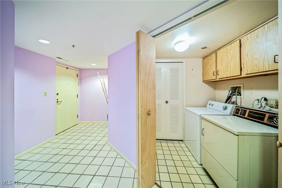 Foyer Entry And Laundry With Side By Side Washer and Dryer