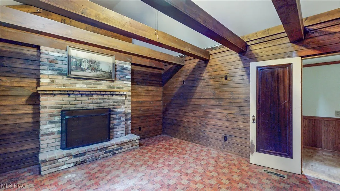 Wood finished walls, vaulted & beamed ceiling, WBFP