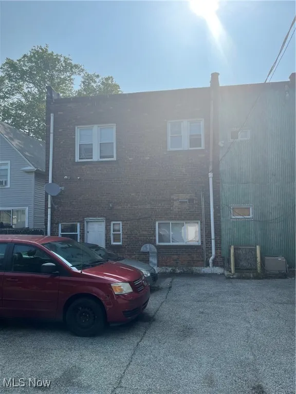 View of front of home with brick siding