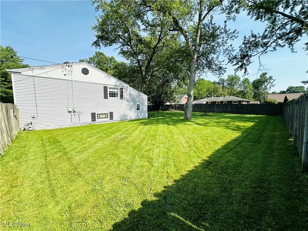 View of fenced backyard