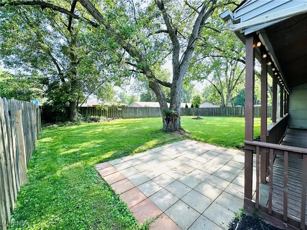 Fenced backyard featuring a patio area