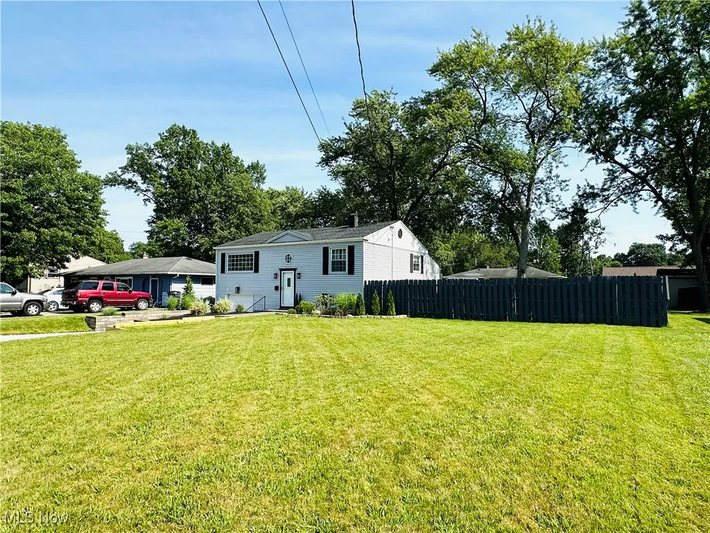 Front side corner view of extra wide lot.