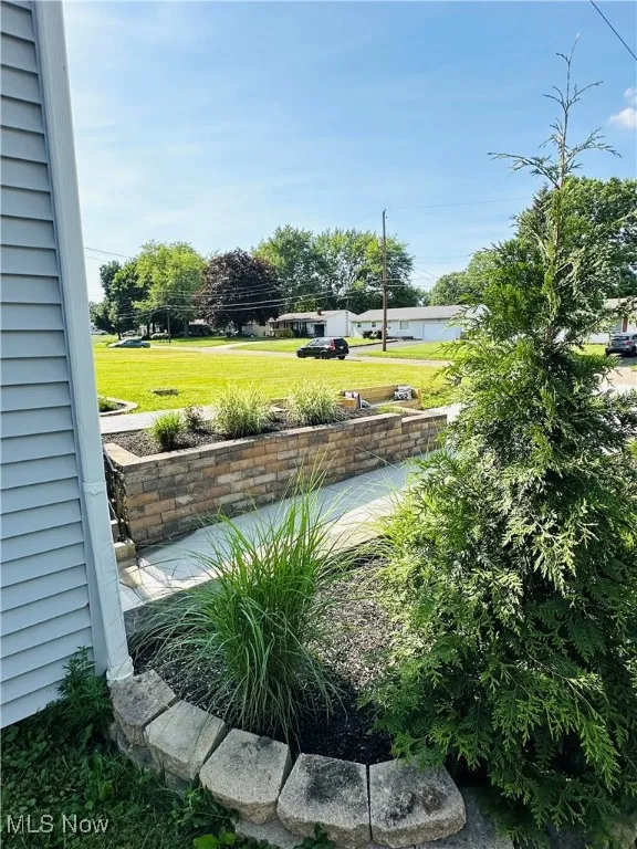View of green lawn & new landscaping!